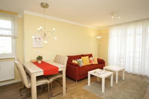 Posezení v ubytování Balkon, gratis Nutzung vom AHOI Erlebnisbad und Sauna in Sellin - Meeresblick FeWo 56