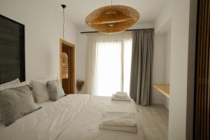 Postel nebo postele na pokoji v ubytování Athos Guesthouse