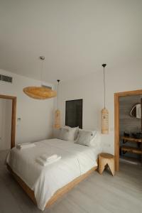 Postel nebo postele na pokoji v ubytování Athos Guesthouse