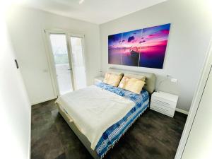 Postel nebo postele na pokoji v ubytování Villaggio A Mare