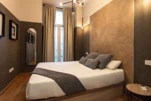 Łóżko lub łóżka w pokoju w obiekcie Suites You Zinc