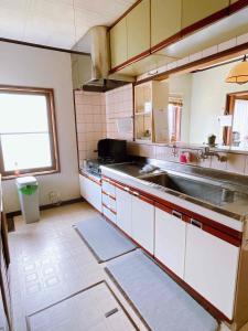 Köök või kööginurk majutusasutuses T&T Fujiyama Guest House
