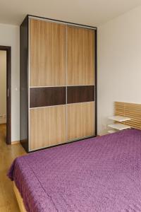 En eller flere senge i et værelse på Apartament Morski