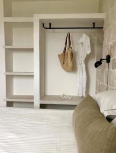 A bed or beds in a room at Trullo Falco