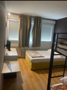Postel nebo postele na pokoji v ubytování Hotel Le Lagon