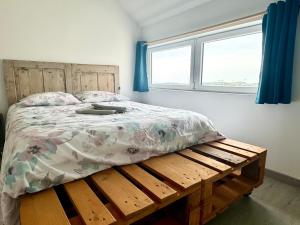 Кровать или кровати в номере L'Opaline - Vue mer