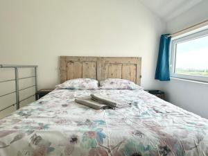 Кровать или кровати в номере L'Opaline - Vue mer