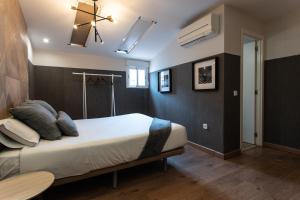 Łóżko lub łóżka w pokoju w obiekcie Suites You Zinc