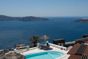 a view of the ocean from a villa at Santorini Princess Spa Hotel in Imerovigli