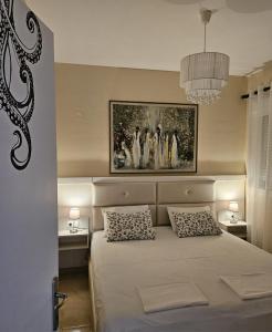 Postel nebo postele na pokoji v ubytování KRAKEN Apartment