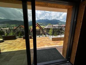 Nespecifikovaný výhled na hory nebo výhled na hory při pohledu z apartmánu