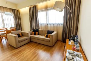 Posezení v ubytování Hotel Caravelas