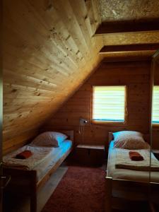 Postel nebo postele na pokoji v ubytování Apartman Relax in Nature + 33 fotografií
