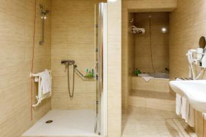 Koupelna v ubytování Hotel Caravelas
