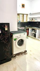 Kuchyň nebo kuchyňský kout v ubytování 1bhk - Boutique Bunglow 458