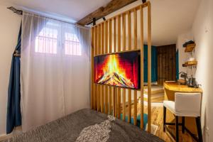 En eller flere senge i et værelse på Studio by Casa Otto