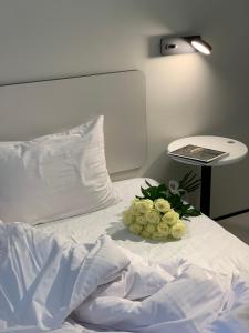 Postel nebo postele na pokoji v ubytování Ultramarinn Hotel