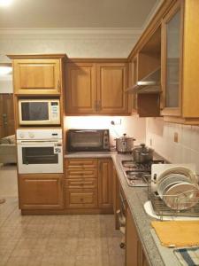 Una cocina o cocineta en Bayan Baru