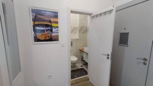 Koupelna v ubytování Brisa Apartment + 15 fotografií