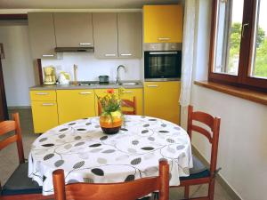 Kuchyň nebo kuchyňský kout v ubytování Apartments Kordić