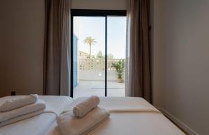 Ένα ή περισσότερα κρεβάτια σε δωμάτιο στο NIU Line - Be Line Group +178 φωτογραφίες