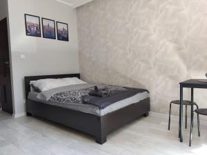 Ένα ή περισσότερα κρεβάτια σε δωμάτιο στο Apartament Curie