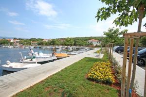 a bunch of boats are docked in a marina at Apartment Mario 2 in Klimno