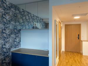 Posteľ alebo postele v izbe v ubytovaní Seaside Park Apartament z widokiem na morze