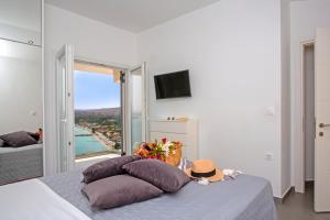 Postel nebo postele na pokoji v ubytování N&L VILLAS + 37 fotografií