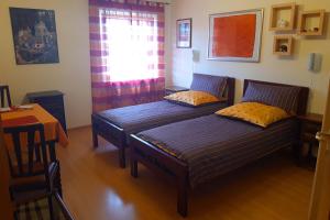 Postel nebo postele na pokoji v ubytování Gästezimmer Leonore