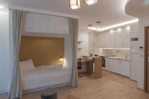 Kuchyň nebo kuchyňský kout v ubytování Cozy Apartments near the Port of Piraeus