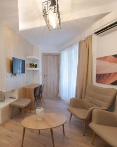 TV a/nebo společenská místnost v ubytování Cozy Apartments near the Port of Piraeus