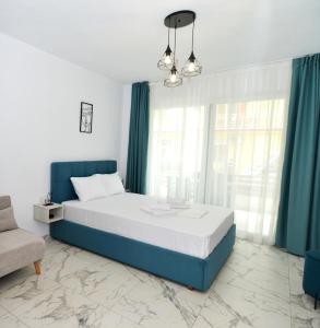 Postel nebo postele na pokoji v ubytování Emerald