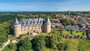 an aerial view of a castle on a hill at L'Olive in Saint-Bazile
