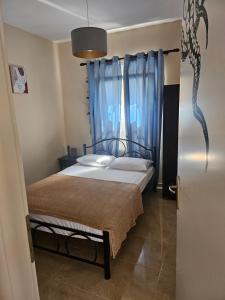 Postel nebo postele na pokoji v ubytování KRAKEN Apartment