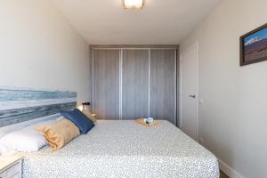 Postel nebo postele na pokoji v ubytování Via Augusta by Unik Tarragona