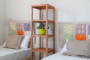 Postel nebo postele na pokoji v ubytování Via Augusta by Unik Tarragona