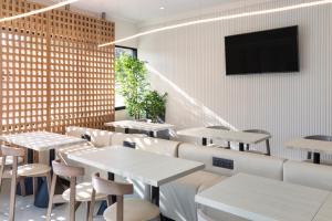TV a/nebo společenská místnost v ubytování B&B HOTEL Guimarães