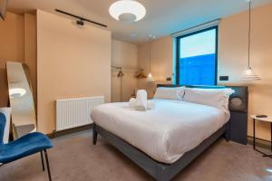 Кровать или кровати в номере ART B&B