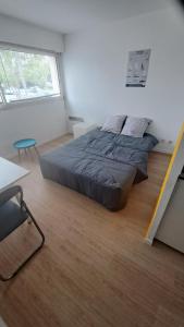 Postel nebo postele na pokoji v ubytování Studio Vannes, 18m2
