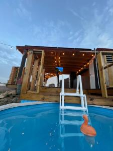 Bazén v ubytování Neymar Beach House nebo v jeho okolí