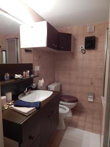 Ванна кімната в Crans Cozy House