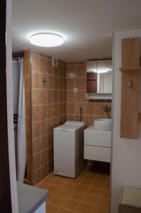 Koupelna v ubytování Apartmány u Jozefa