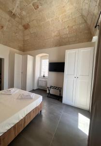 Giường trong phòng chung tại Casa LA TORRETTA