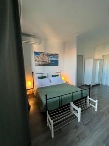 Cama o camas de una habitación en Alta Dimora b&b suites