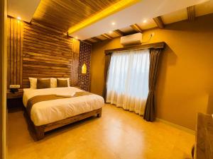 Postel nebo postele na pokoji v ubytování Hotel Matina Suites