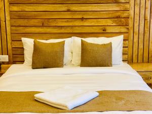 Postel nebo postele na pokoji v ubytování Hotel Matina Suites