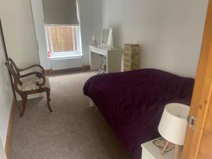 En eller flere senge i et værelse på The Old Forge