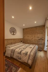 Postel nebo postele na pokoji v ubytování Incantevole appar chalet nuovo