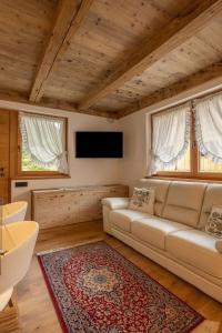 TV a/nebo společenská místnost v ubytování Incantevole appar chalet nuovo